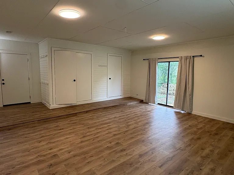 Large storage room with electric W/D hookup and closet