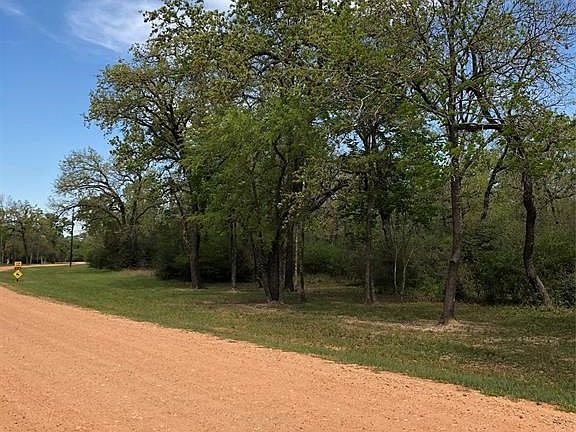 Community maintained gravel road, property is on right