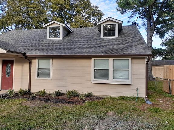 Front of home landscaping, new windows throughout.