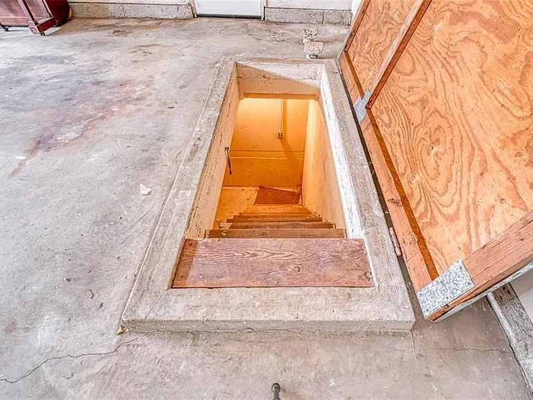 Large storm shelter, nearly 10'x12' with light, heater, and vents.