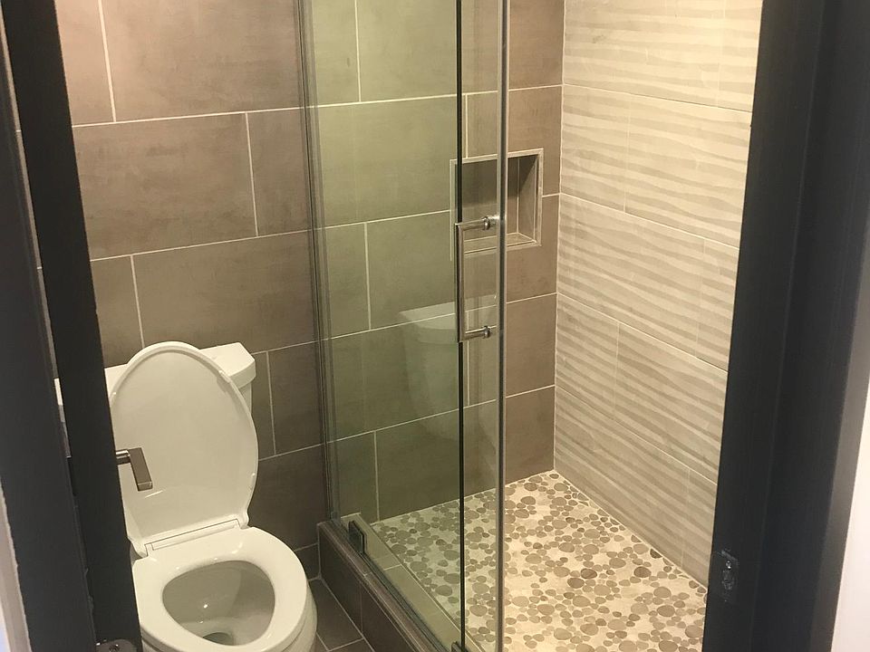 Shower room for first floor bedroom has imported Spanish tiles