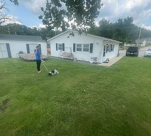 Facing the lake and side of house