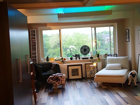 Queen Murphy bed up/closed (not down/open).
