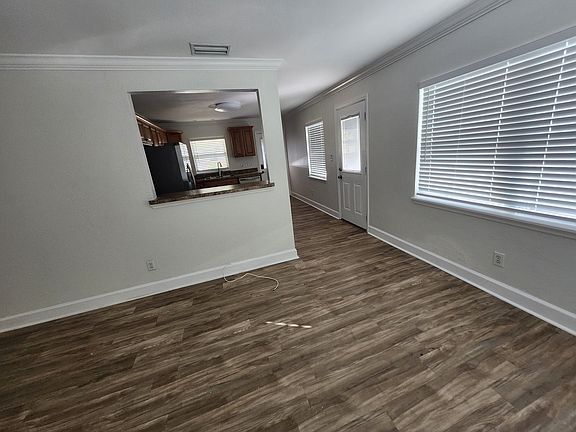 Living room facing kitchen
