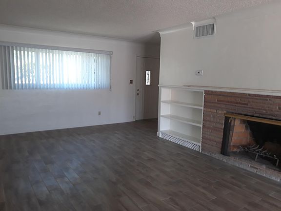 living room with fireplace. view 2