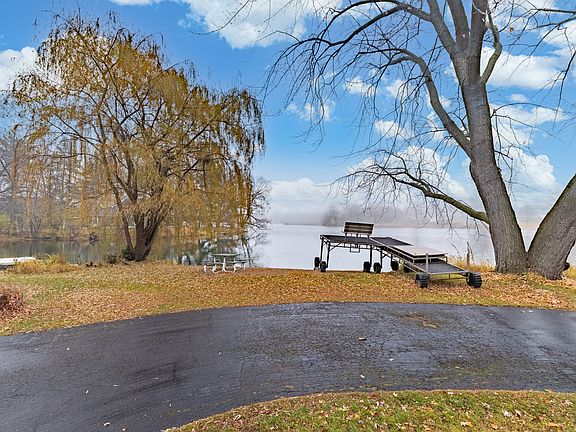 Big private sandy beach and a dock that can be used in the summer for fishing, boating, swimming or just sitting.