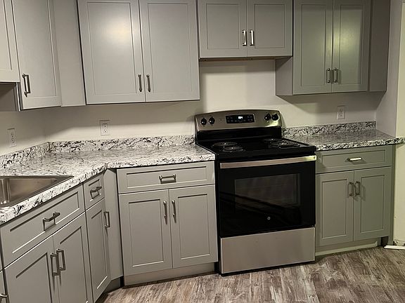 Kitchen with New Stainless Steel Stove