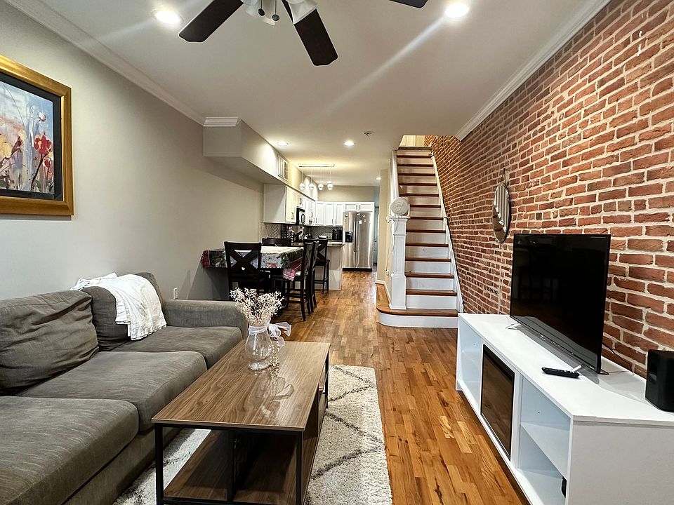 Living room, dining room, and kitchen on ground floor