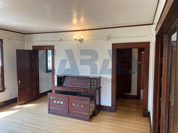 Bathroom and closet behind hutch/murphy/storage.