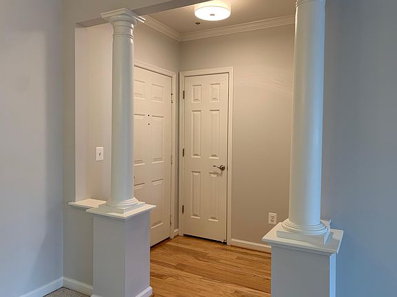 Entrance Foyer with hardwood flooring