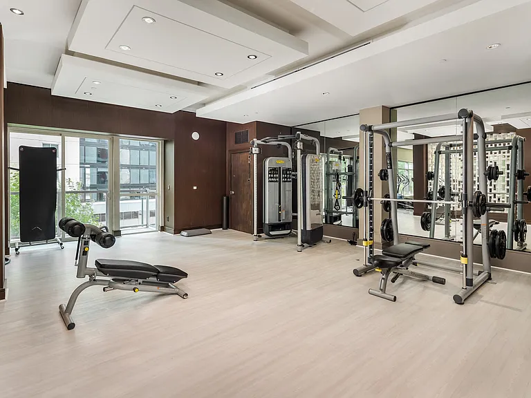 Mirror-Walled Strength Studio with Top-of-the-Line Gym Equipment