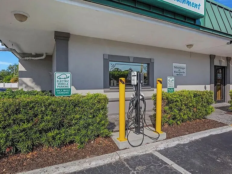Two EV charging parking spots. 1st come 1st served, pay by app.