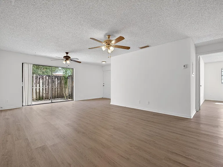 Wide open floor plan with new vinyl plank flooring