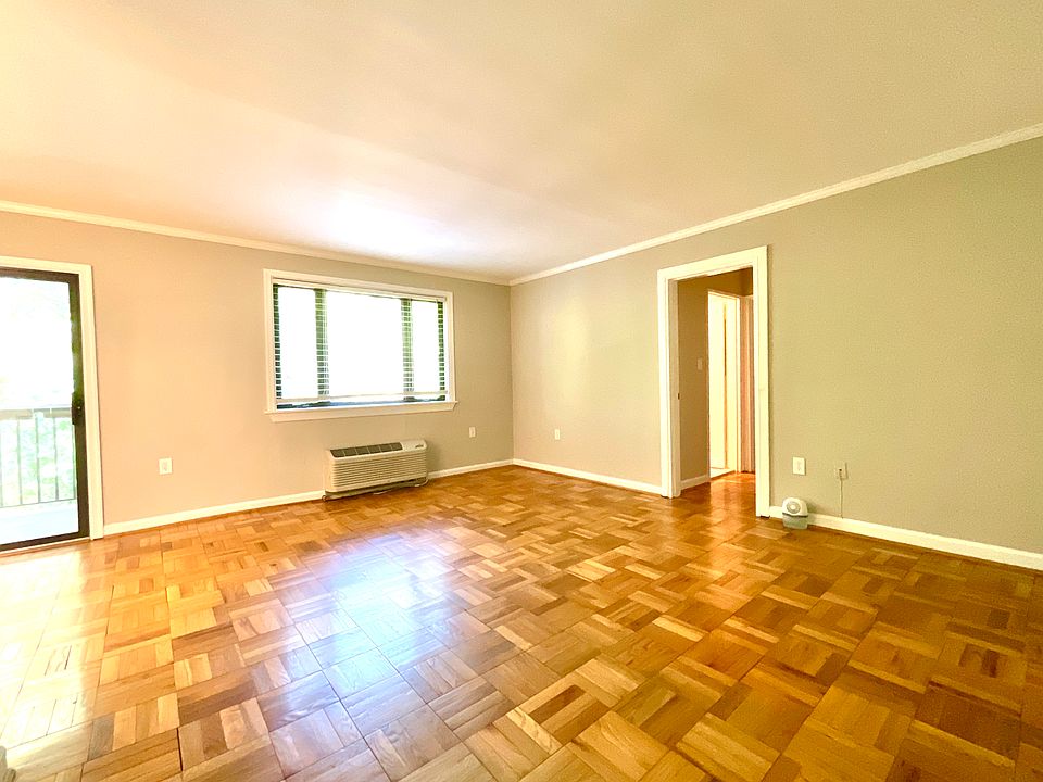 Unit 210 Living Room and entrance to Bedroom Hallway