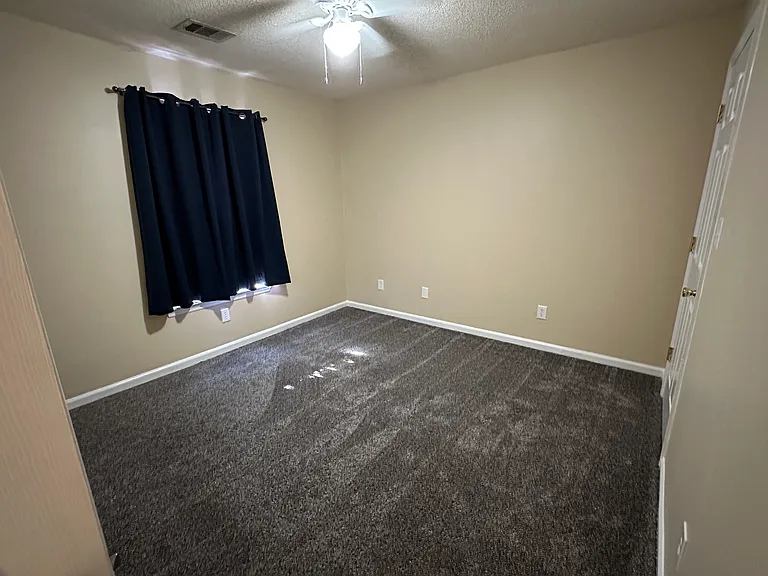 Second bedroom has private access to second full bathroom. Ceiling fan light.