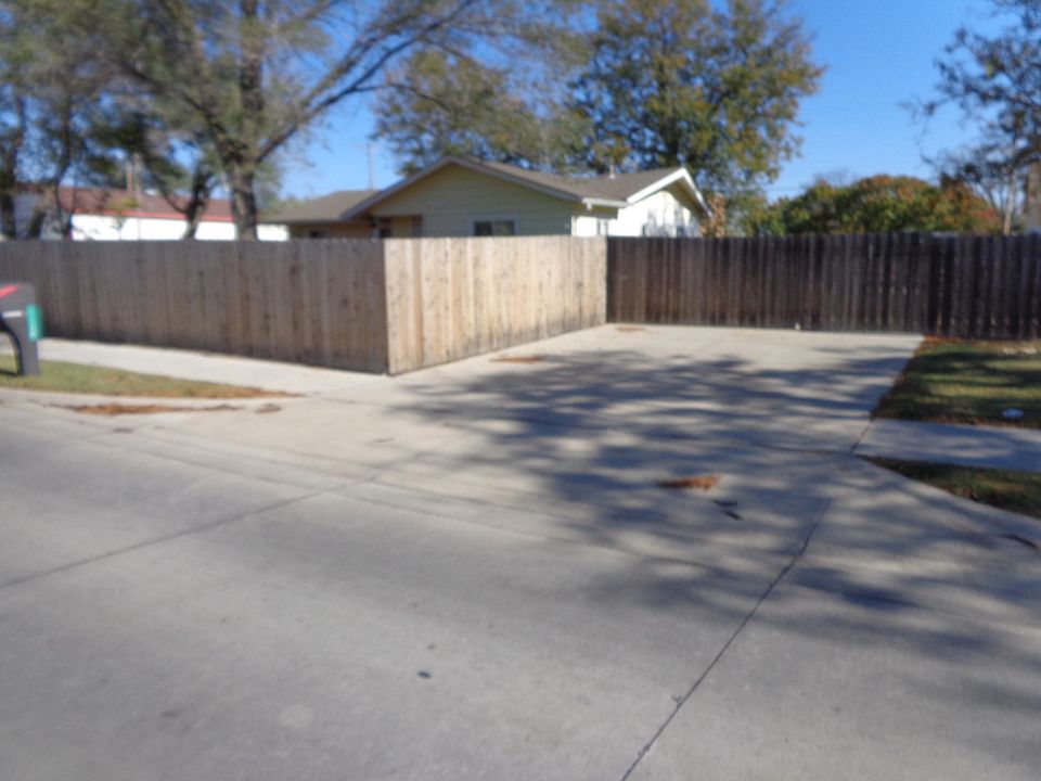 cedar privacy fence with sliding front gate