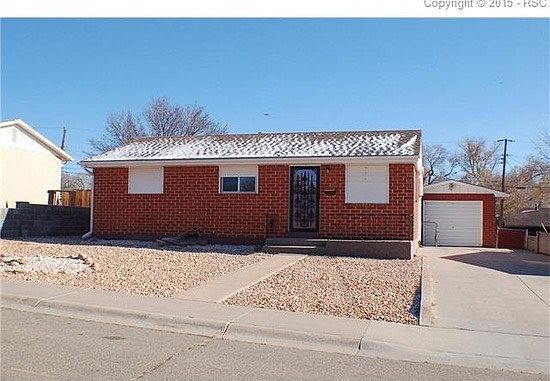 Front with garage and driveway
