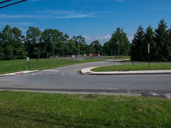 Grass hill / open space at School across street