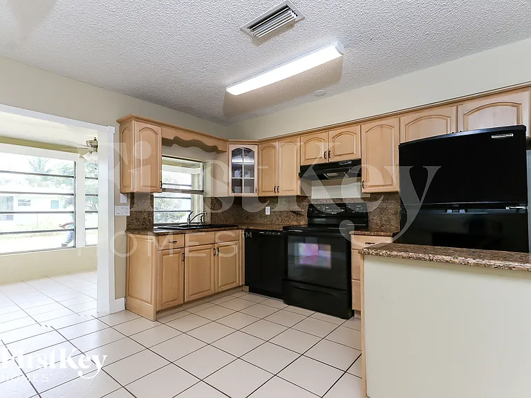 9341 NW 24th Pl — Photo 7