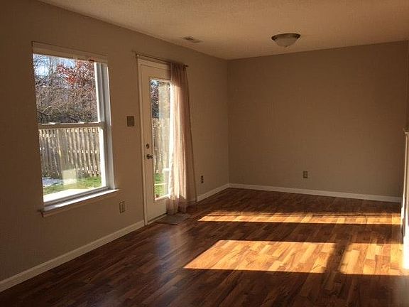 Sun filled family room - new laminate floor