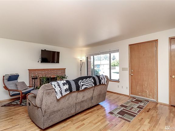 Enjoy your peaceful neighborhood from the big picture window, still 3 more original owners on this serene - no traffic street.