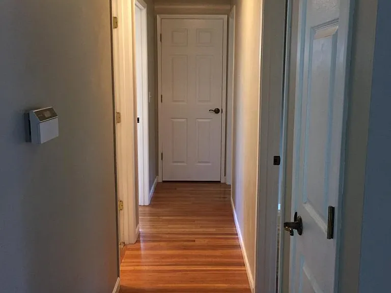 hallway with storage closet/linens