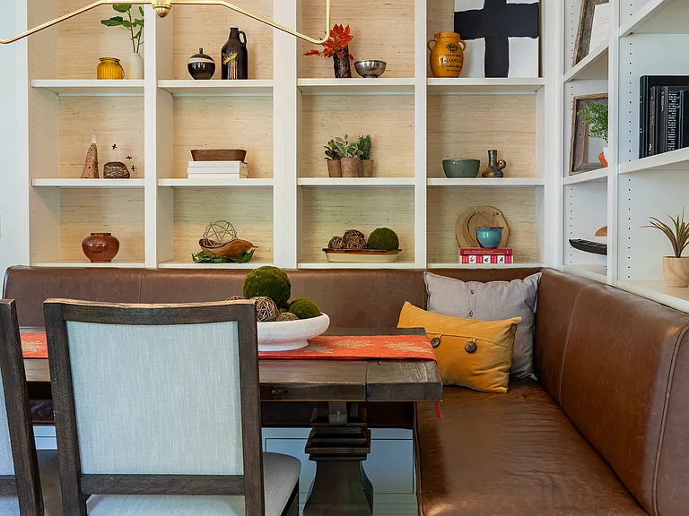 Custom, hand-sewn leather banquette offers ample seating for little friends during birthday parties.