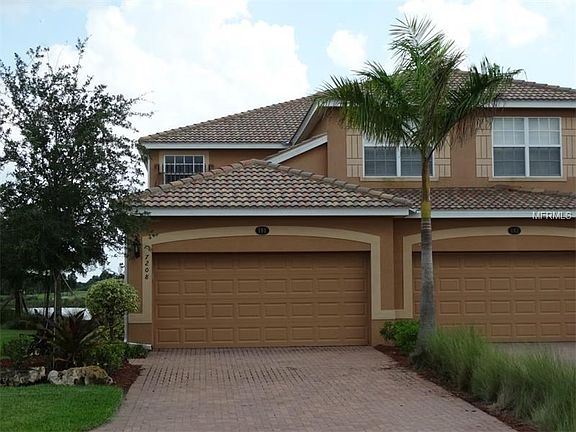 This home is a downstairs, end unit with 2 car garage.