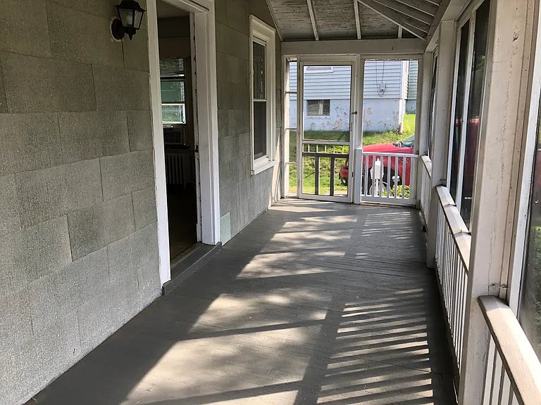 Front porch leading to private driveway