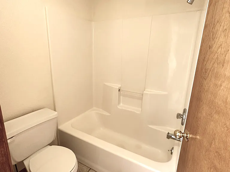 Primary Bathroom - Private Toilet + Tub/Shower Room