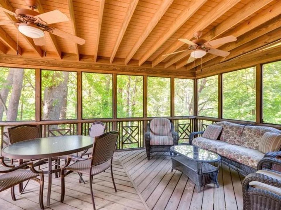 Absolutely stunning screened in porch. This sold us on the home! New furniture in it now. It_s like being in the middle of a forest. Our home backs up to a power line easement so there are no neighbors within eyesight behind the home.