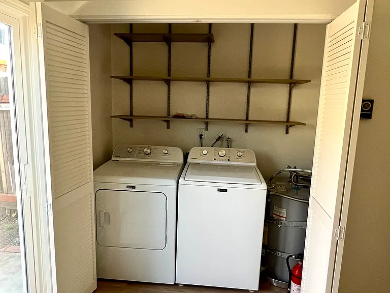 New Washer/Dryer behind Bifold Doors, new shelving