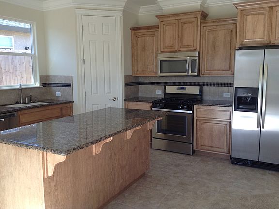 Kitchen with hickory cabinets