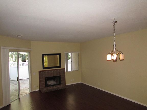 Large Living Room/Dinning Room area with Fireplace