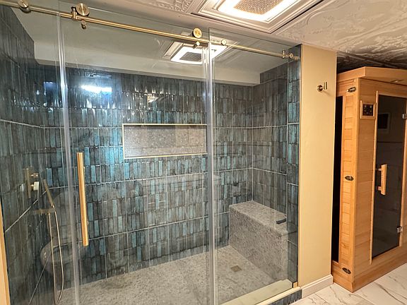 oversized shower with infrared sauna