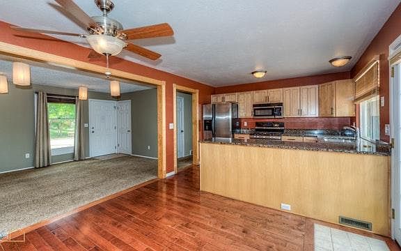 Open floor plan dining room into living room