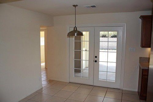 Eat in dining area with French doors connecting to patio