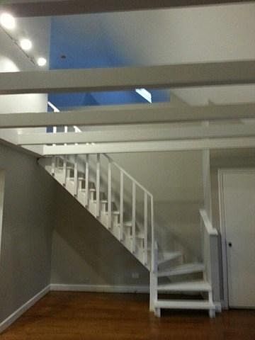 Living Room and Stairs to Loft