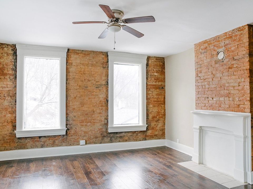 Living Room/Bedroom can be perfect for 1 or 2 people. Brick above mantle is great for hanging a TV