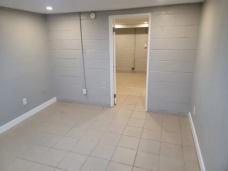 Main bedroom, with view into flex room.