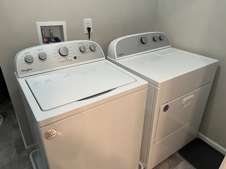 New dishwasher and dryer in the separate laundry room