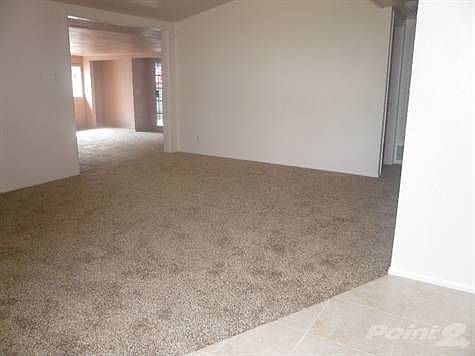Living Room with View Into Family Room