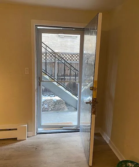 Front Door with secure storm door.