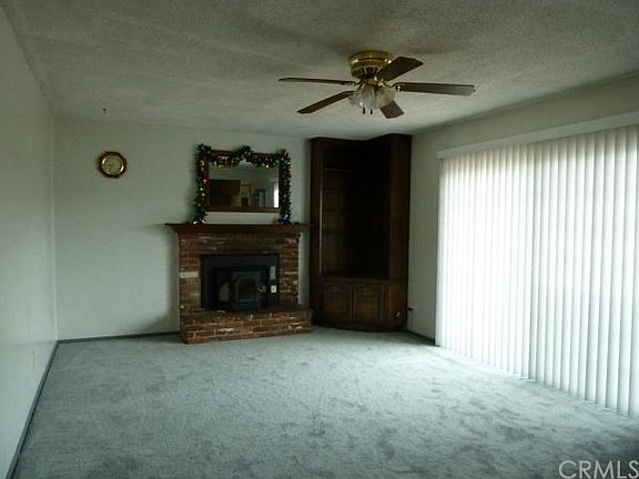 Family Room with Pellet stove and built-in Birch cabinet