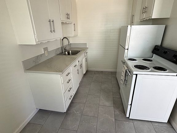 Easy to clean countertop and new sink and faucet