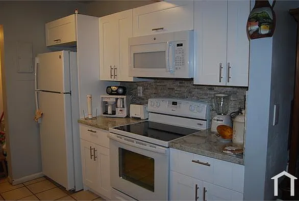 680 NW 114th Ave #203 — Photo 1