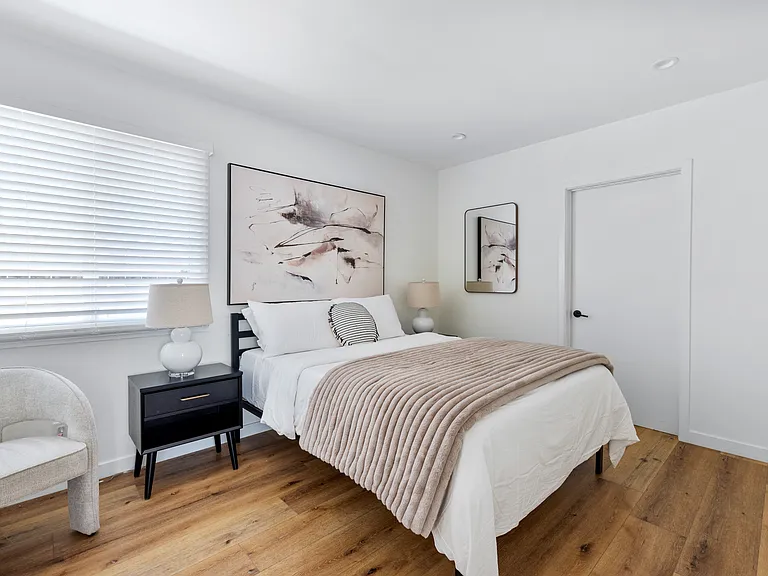 Primary bedroom suite with queen bed