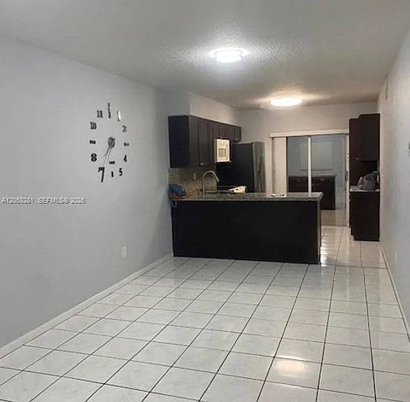 2390 W 74th St #202 — Photo 2