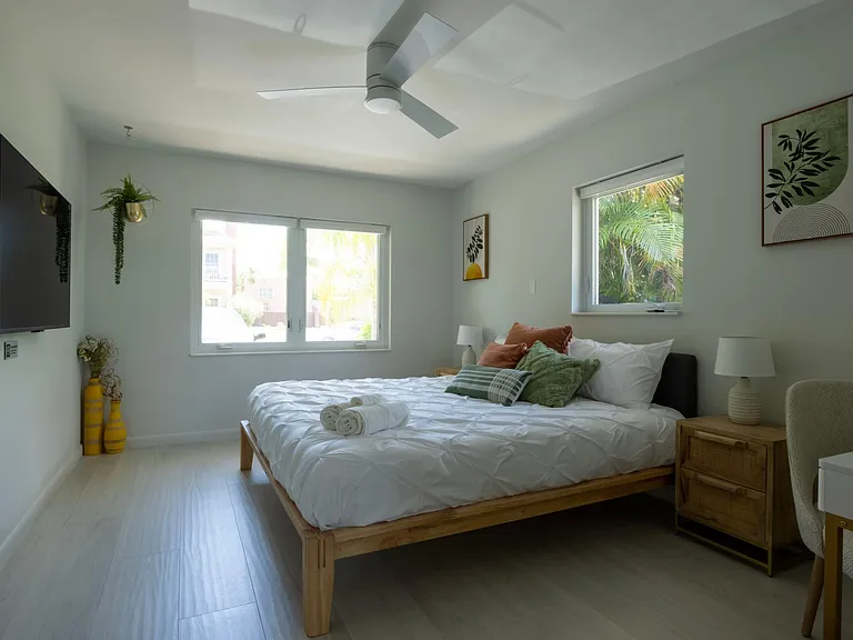 Master bedroom #2 with private full size bathroom with walk-in shower (glass wall).