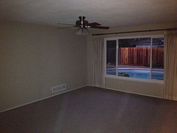 Living room with pool view